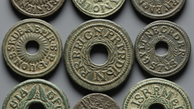 How come some ancient coins had holes in the middle?